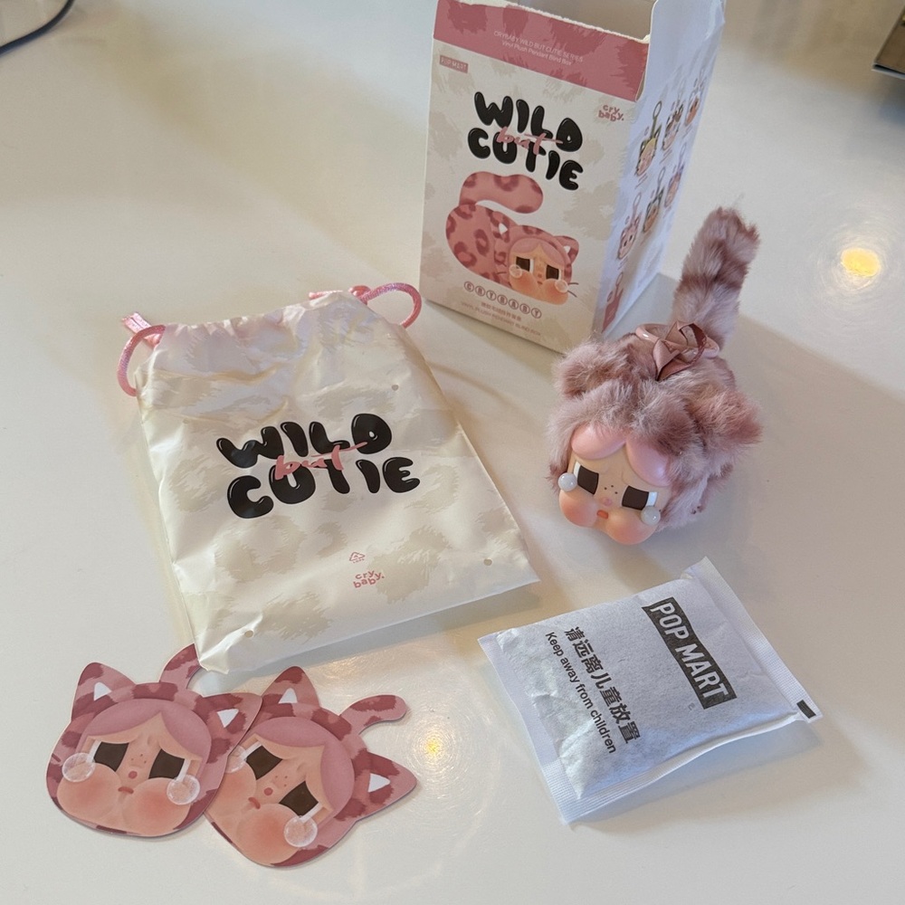 Pop Mart CRYBABY Wild but Cutie Series - Vinyl Plush Pendant PINK Cutie.